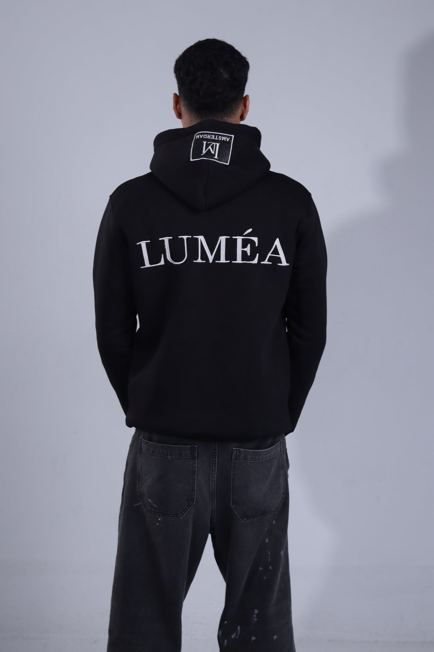 Luméa Statement Hoodie - Black