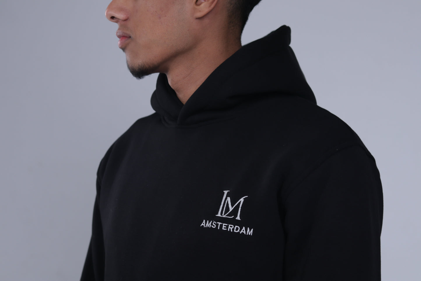 Luméa Statement Hoodie - Black