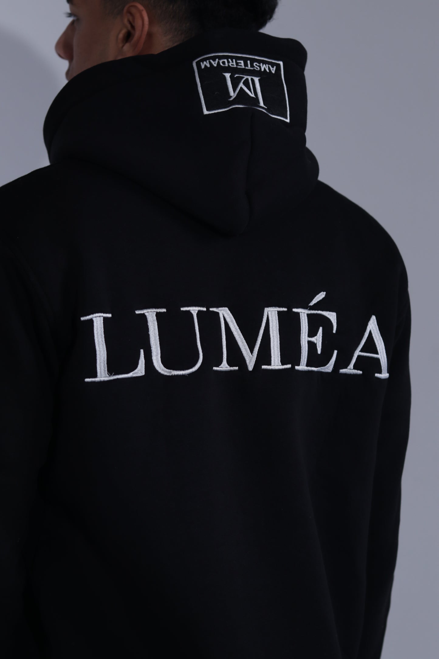 Luméa Statement Hoodie - Black